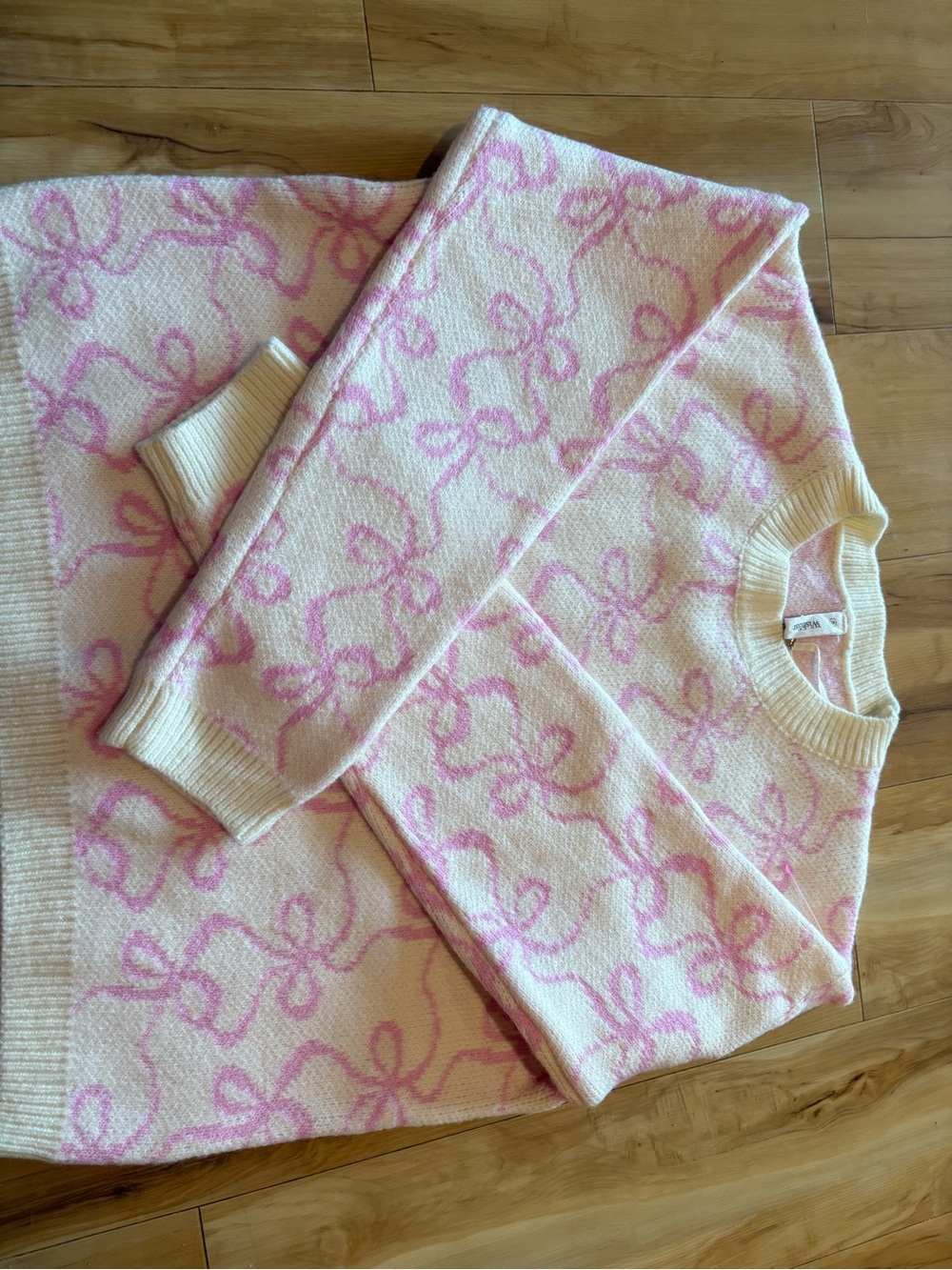 Cream Crewneck Sweater with Pink Bow Pattern